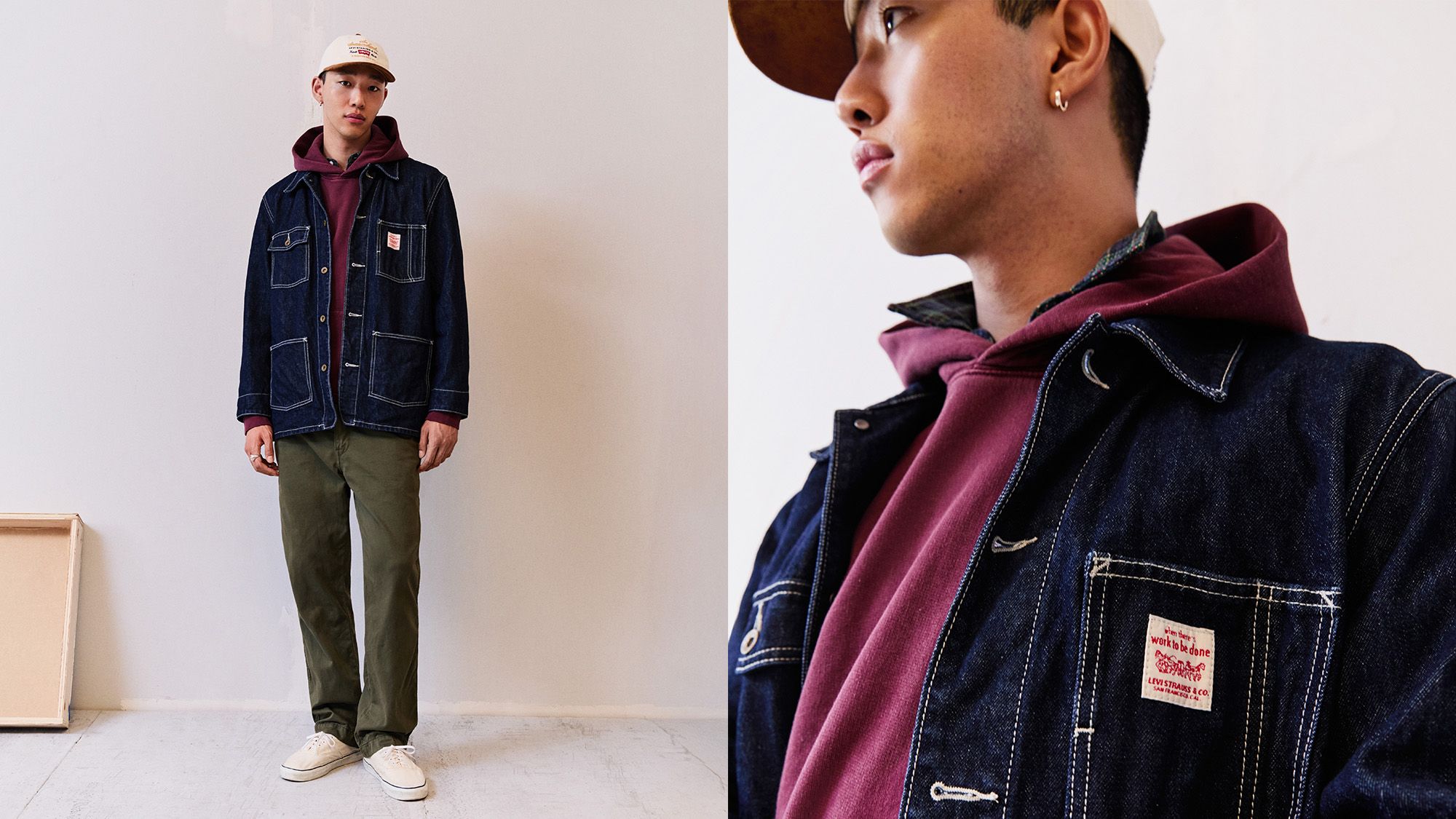 Model in red hoodie, dark wash denim jean jacket, and green pants