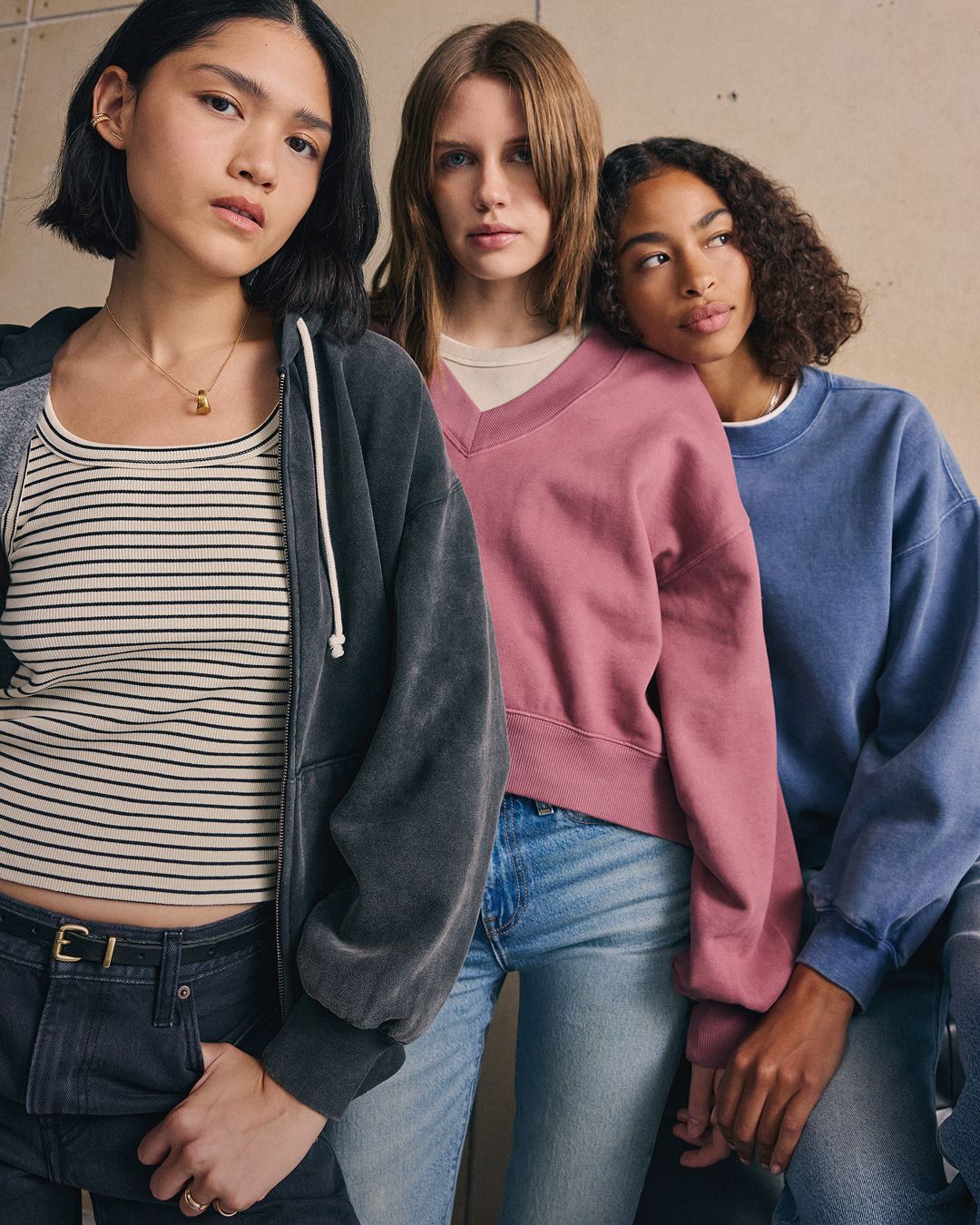 Models in women's assorted sweatshirt styles