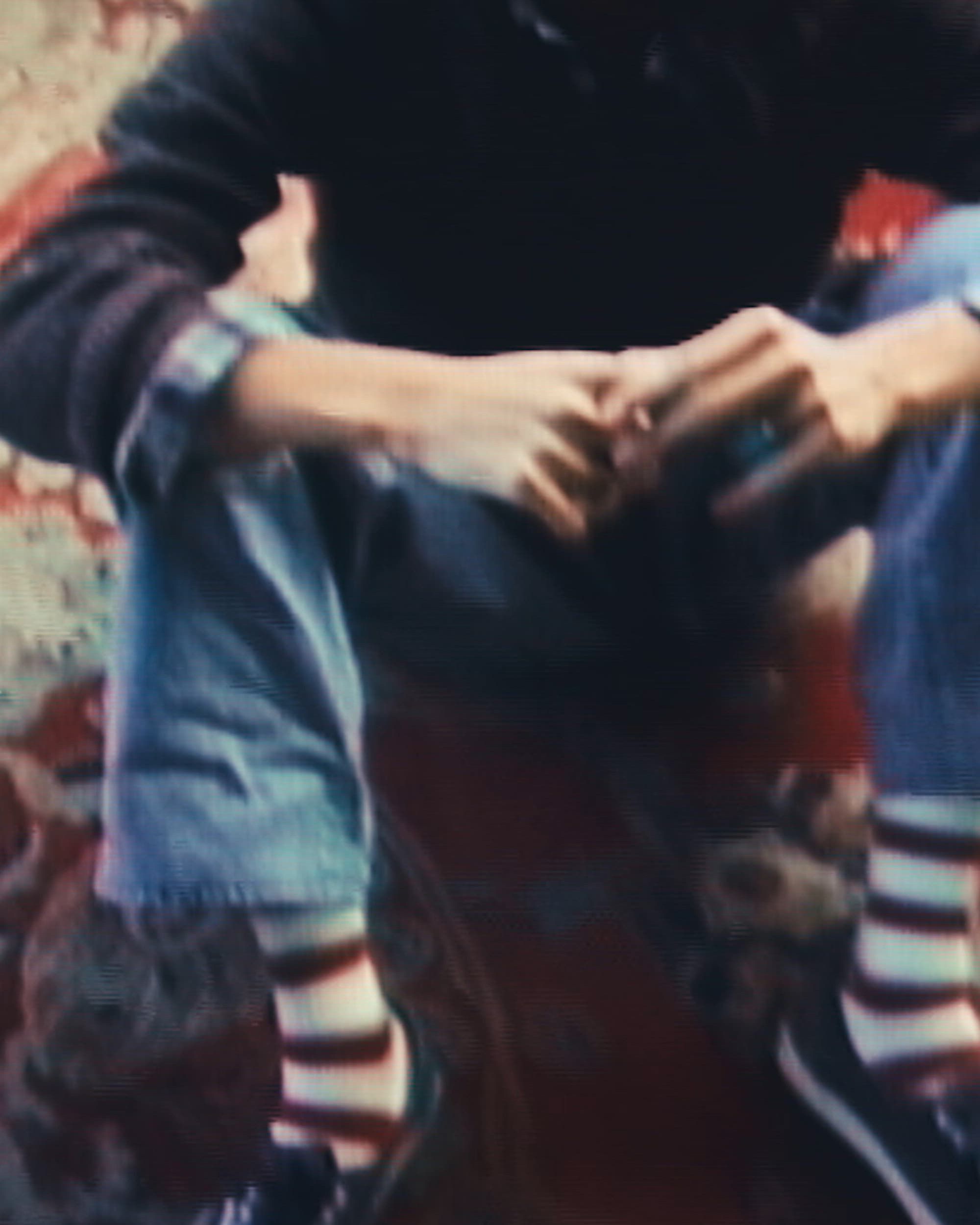 Video of model in Levi's pre-spring looks.