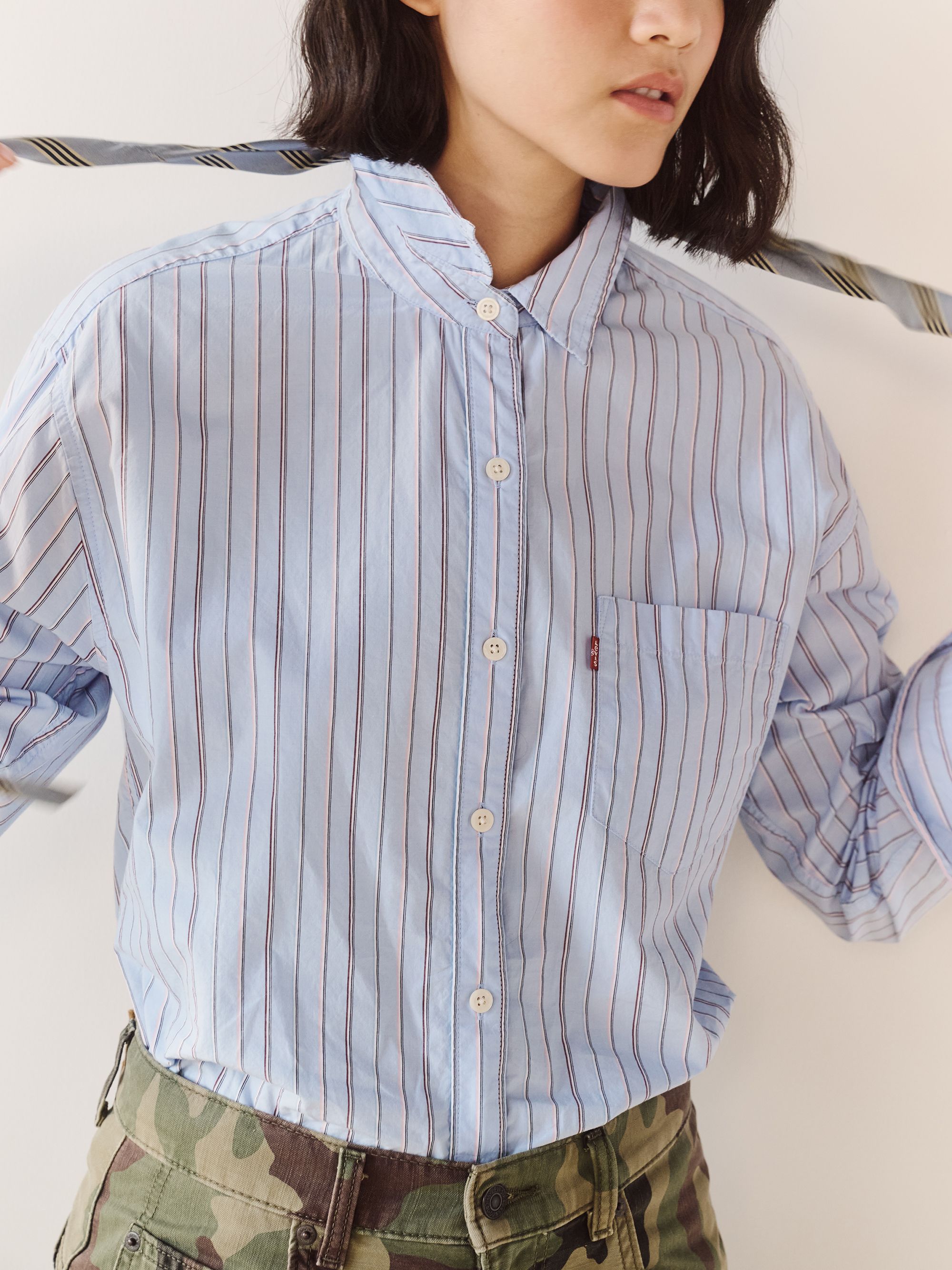 Model wearing harlie boyfriend shirt