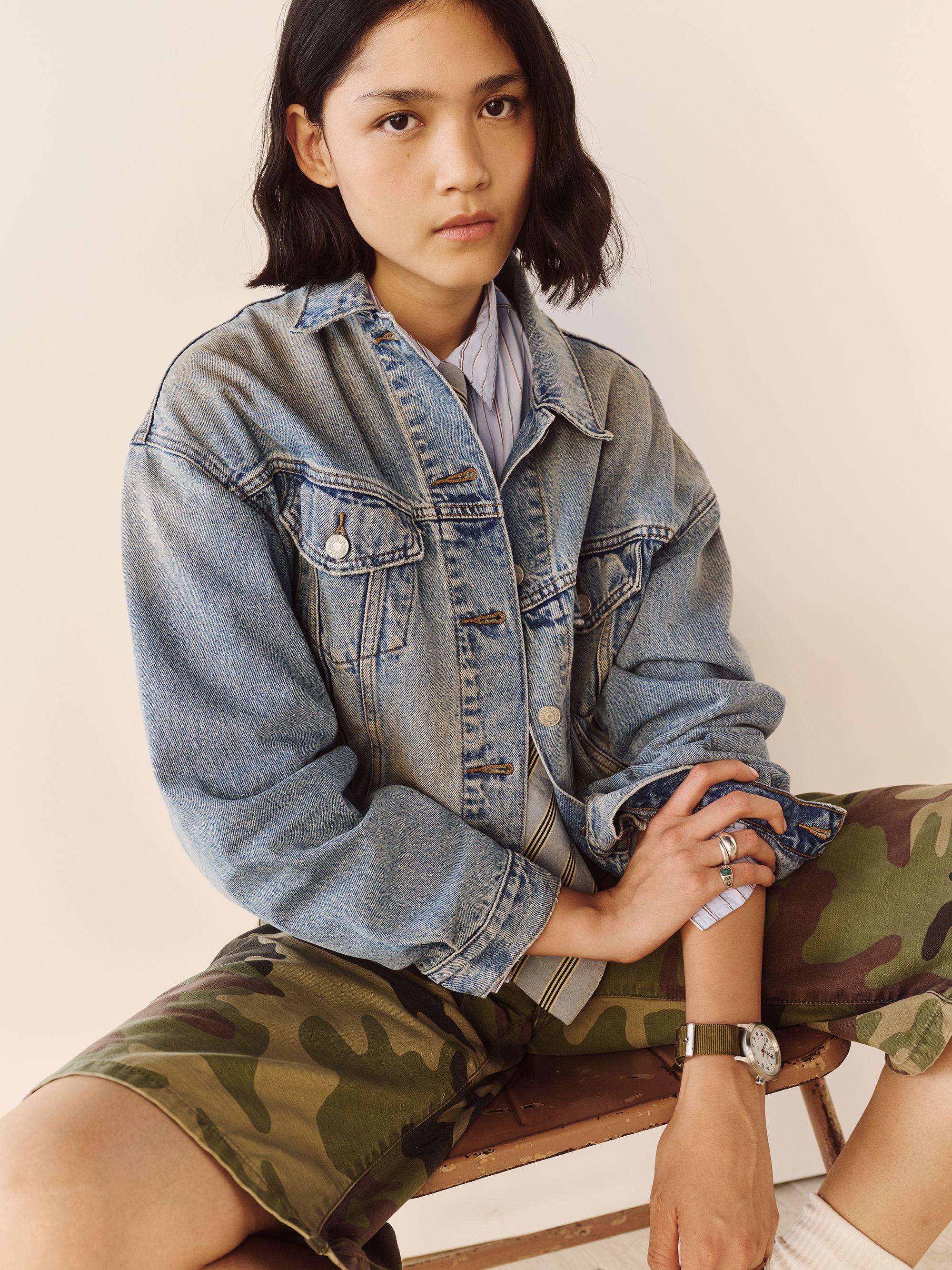 Model wearing trucker jacket