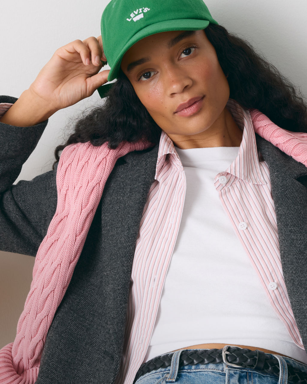 Model in layered women's tops