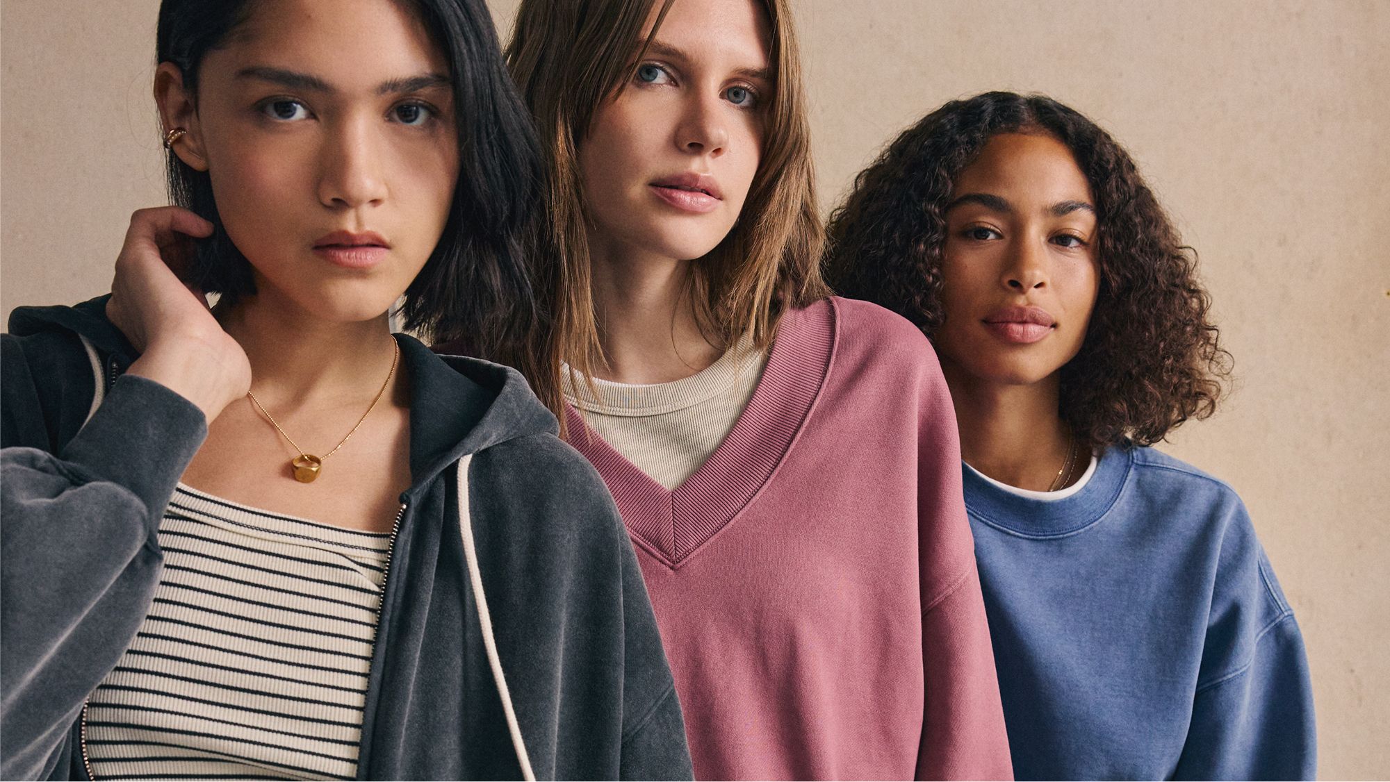 Models in assorted garment dyed sweatshirts