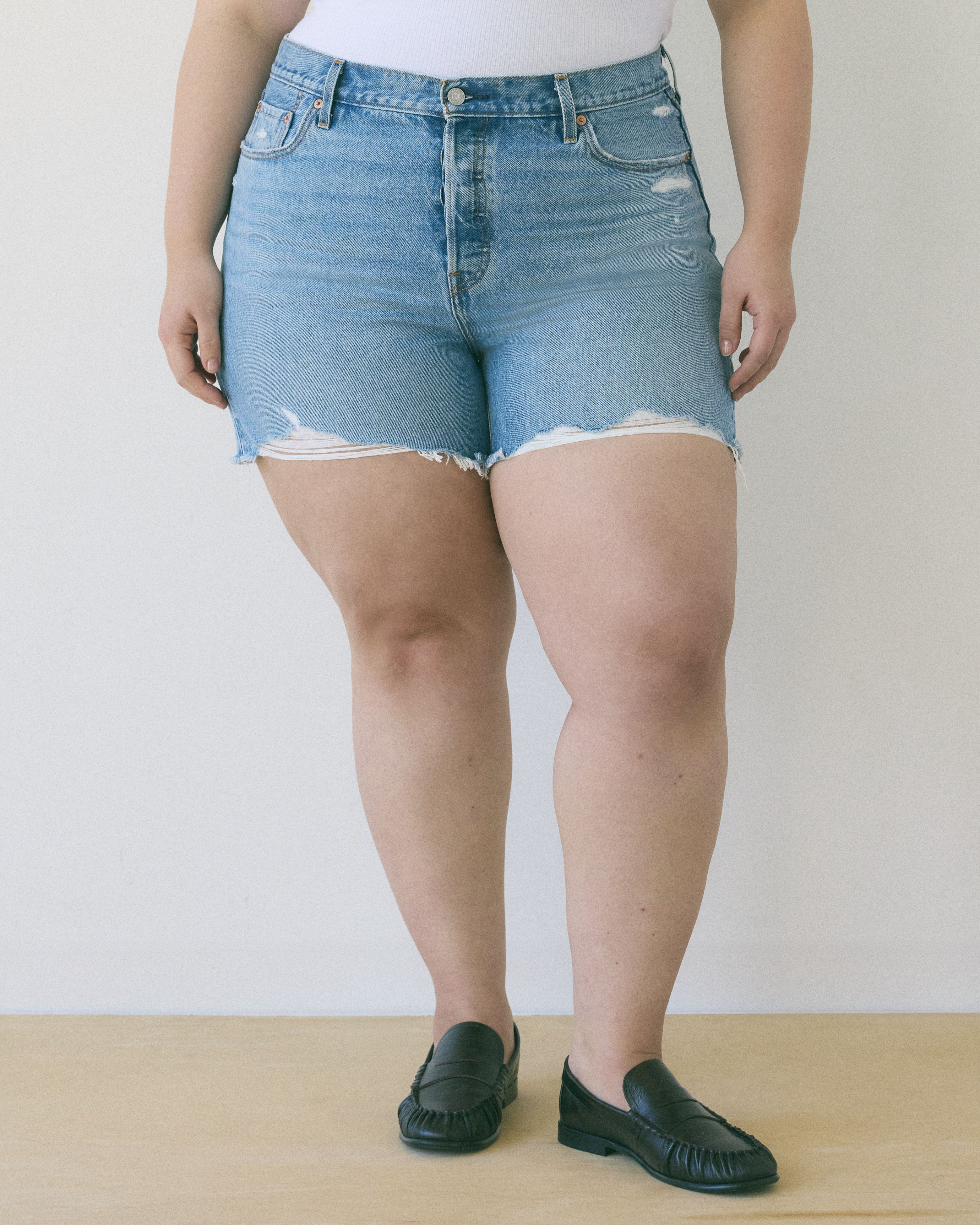 Model wearing plus-sized shorts