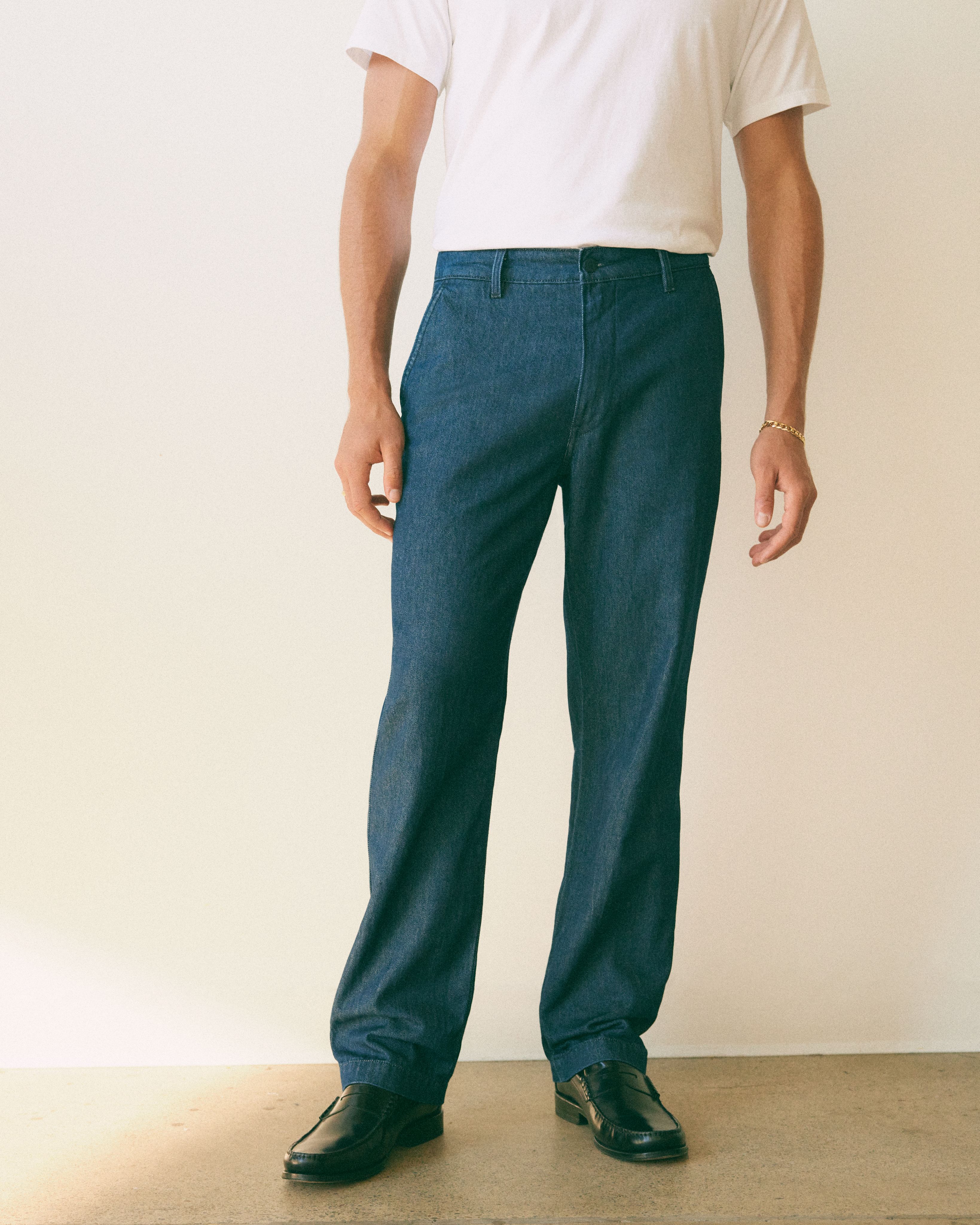 Model wearing green XX Chino Pants.