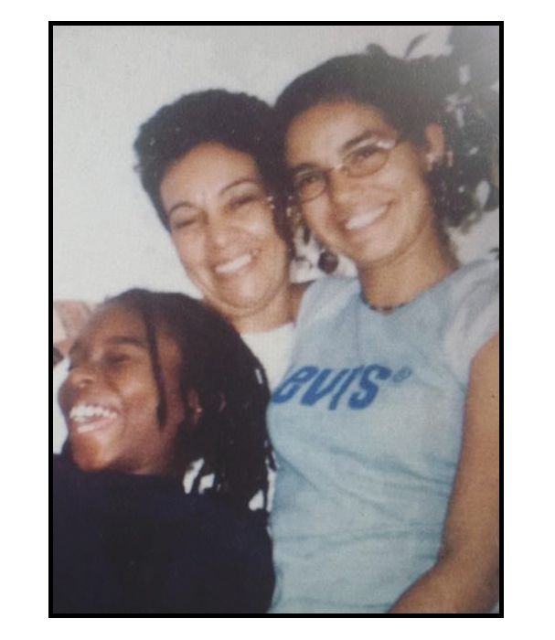 Family photo of Micaela Stuart with her mother and cousin.