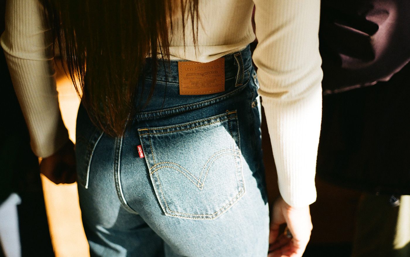Close-up image of the back of ABIR's Levi's jeans.
