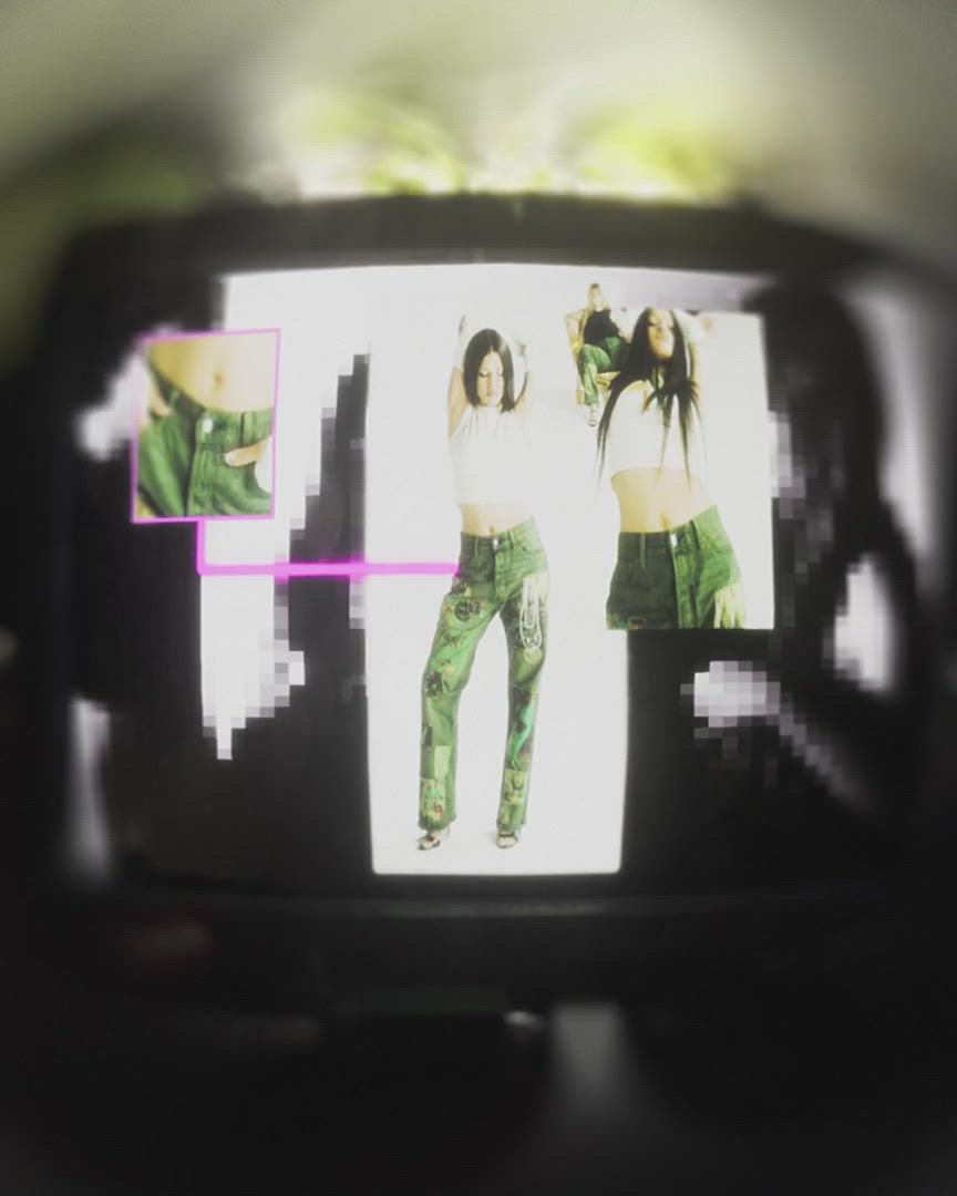 Glitchy 00s tech video of Barbie Ferreira and other models in her patchwork jeans