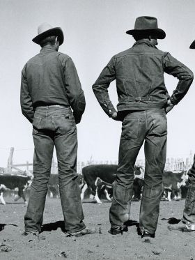Two men standing wearing Levi's.