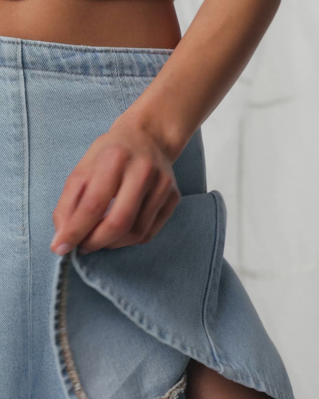 Video of model in assorted lightweight denim styles