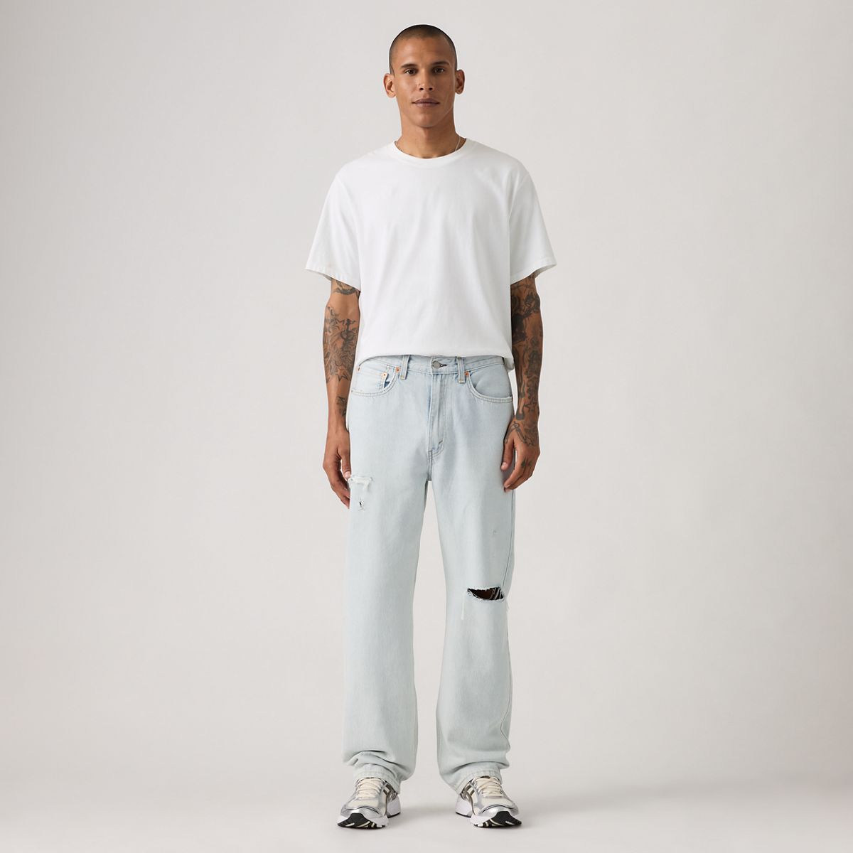 565™ Loose Straight Men's Jeans — Hint Of Indigo Distressed - Light Wash