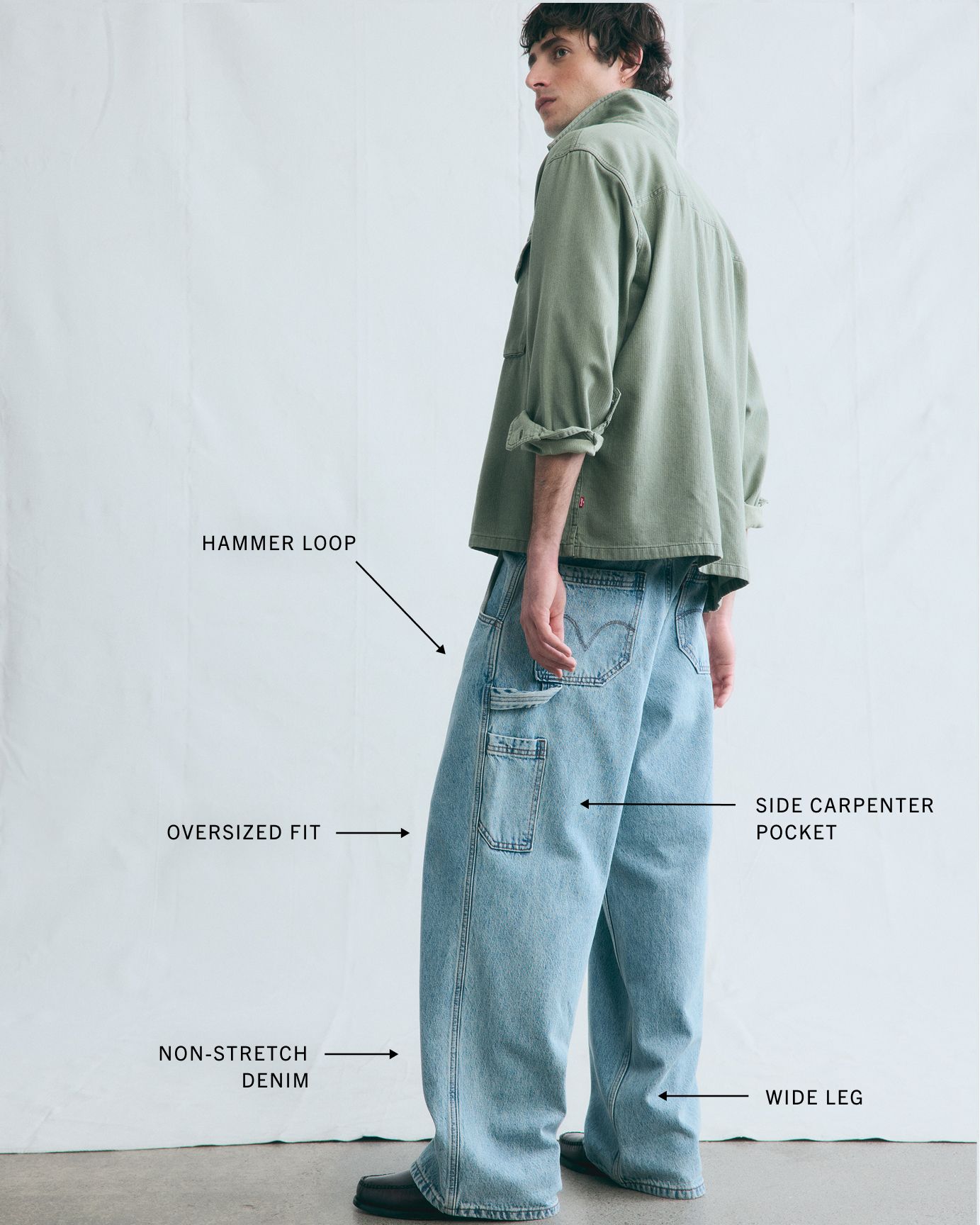 Model wearing extra baggy utility