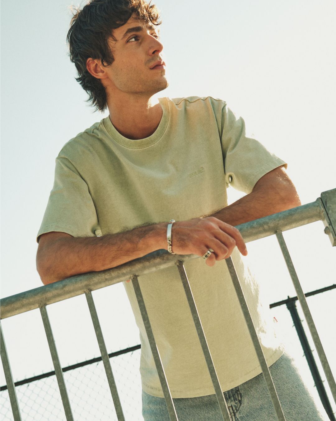 Model in men's tee