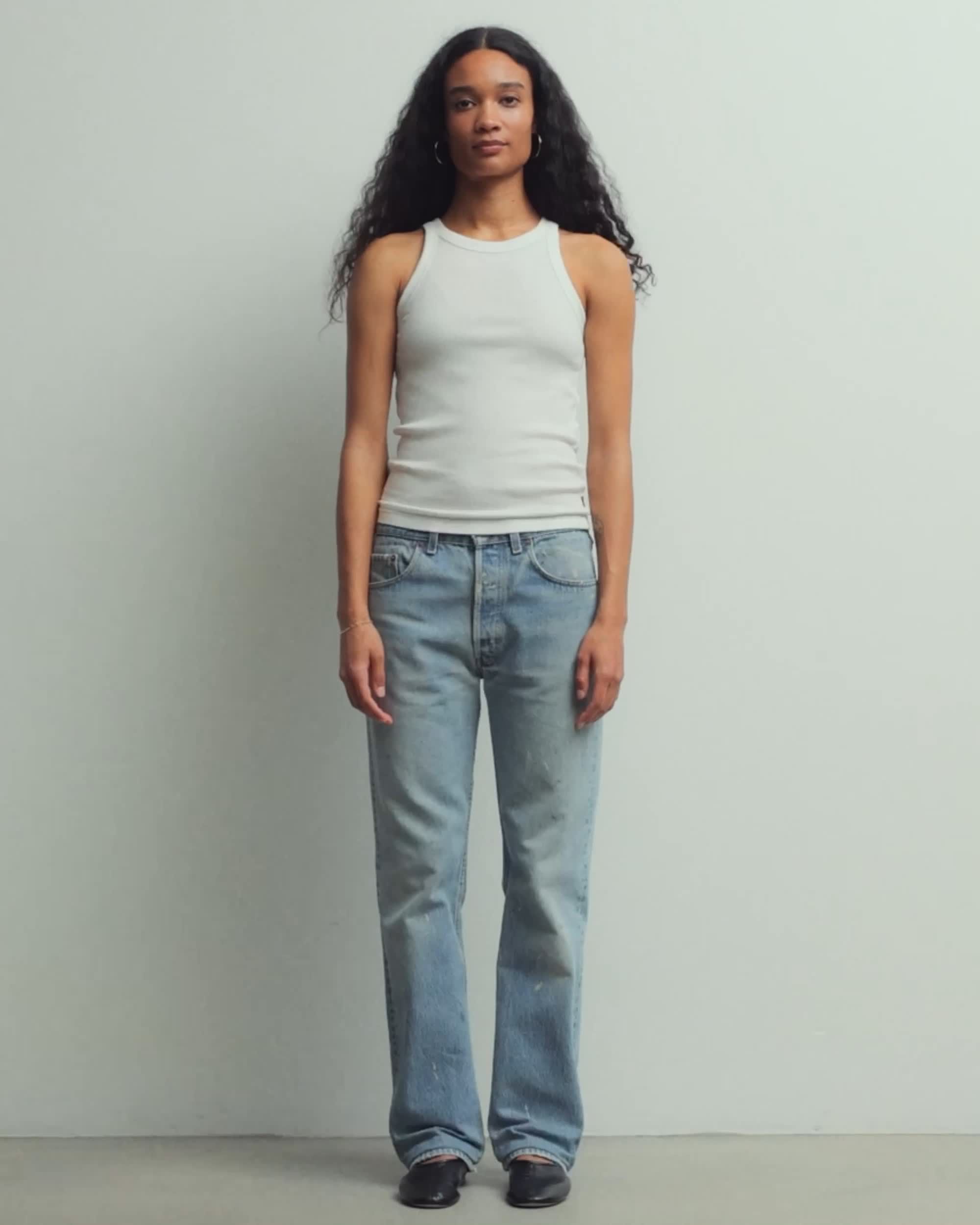 Model wearing white tee 