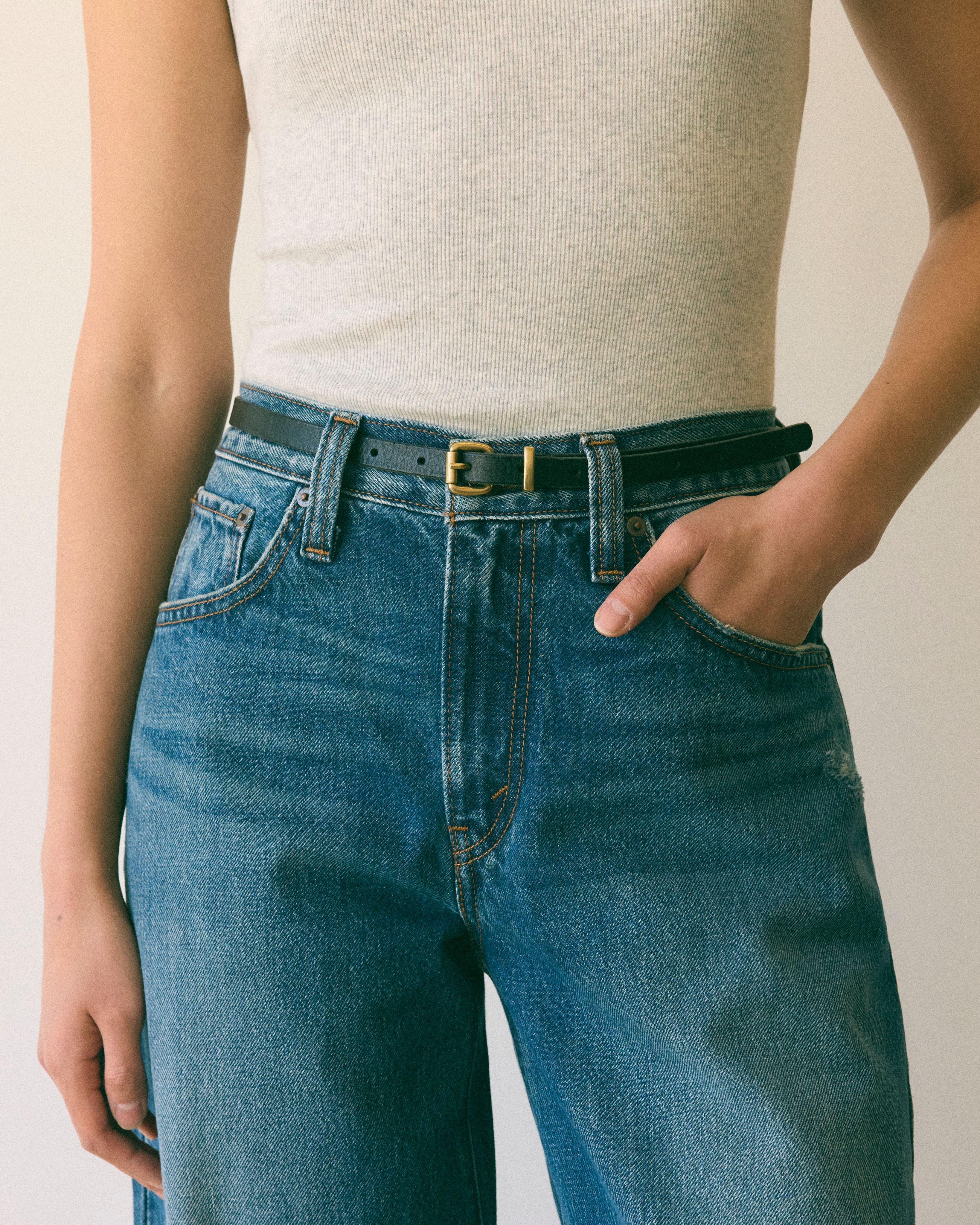 Black belt with gold buckle
