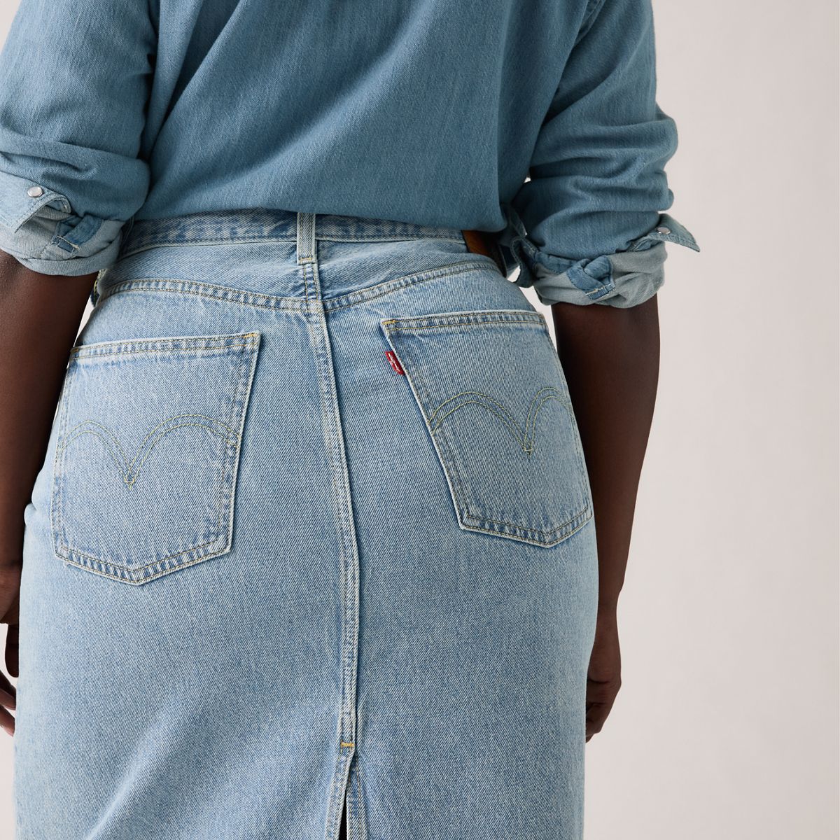 High Rise Slit Skirt — Riveting Clean Hem - Light Wash