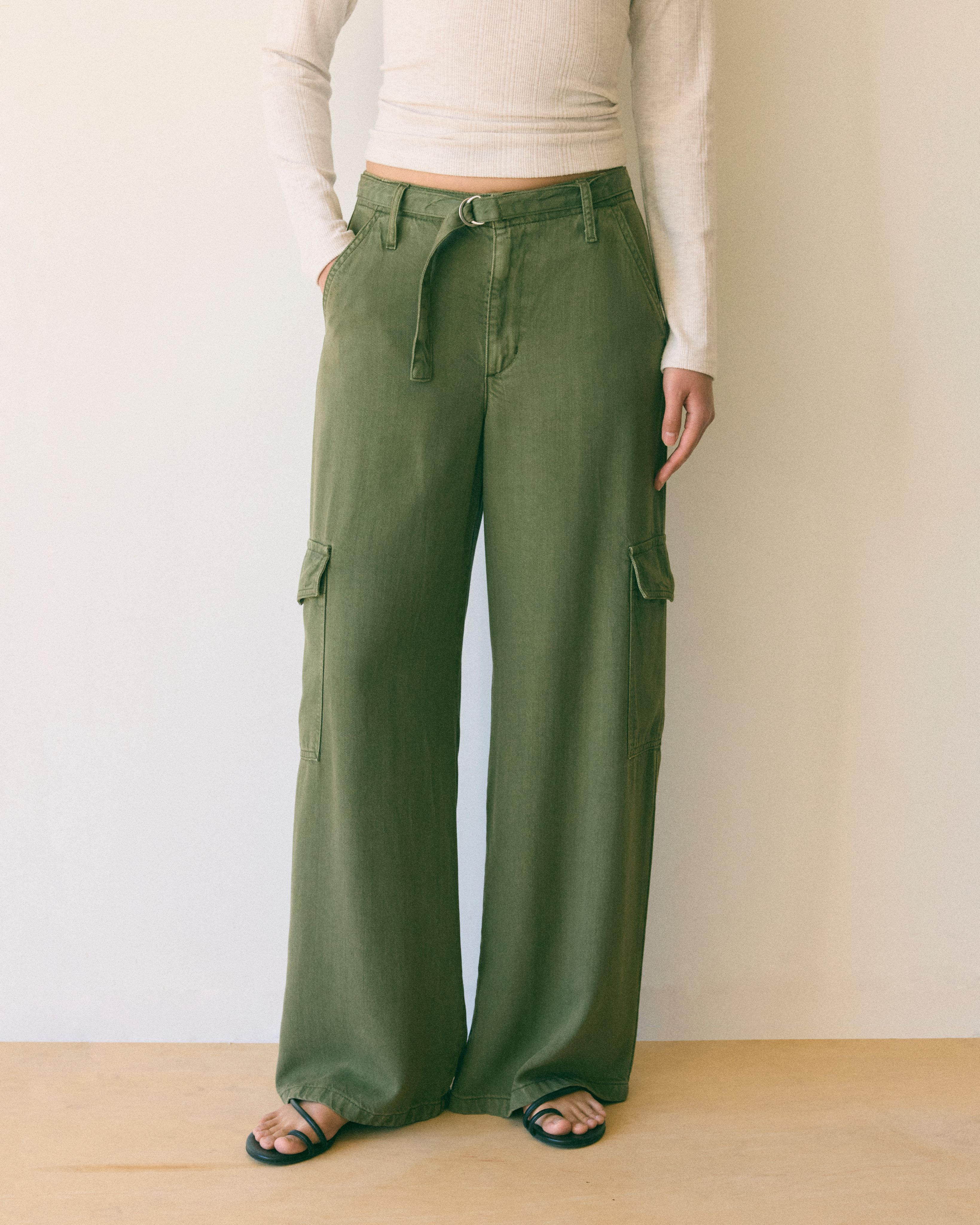 Female model wearing baggy dad cargo pants