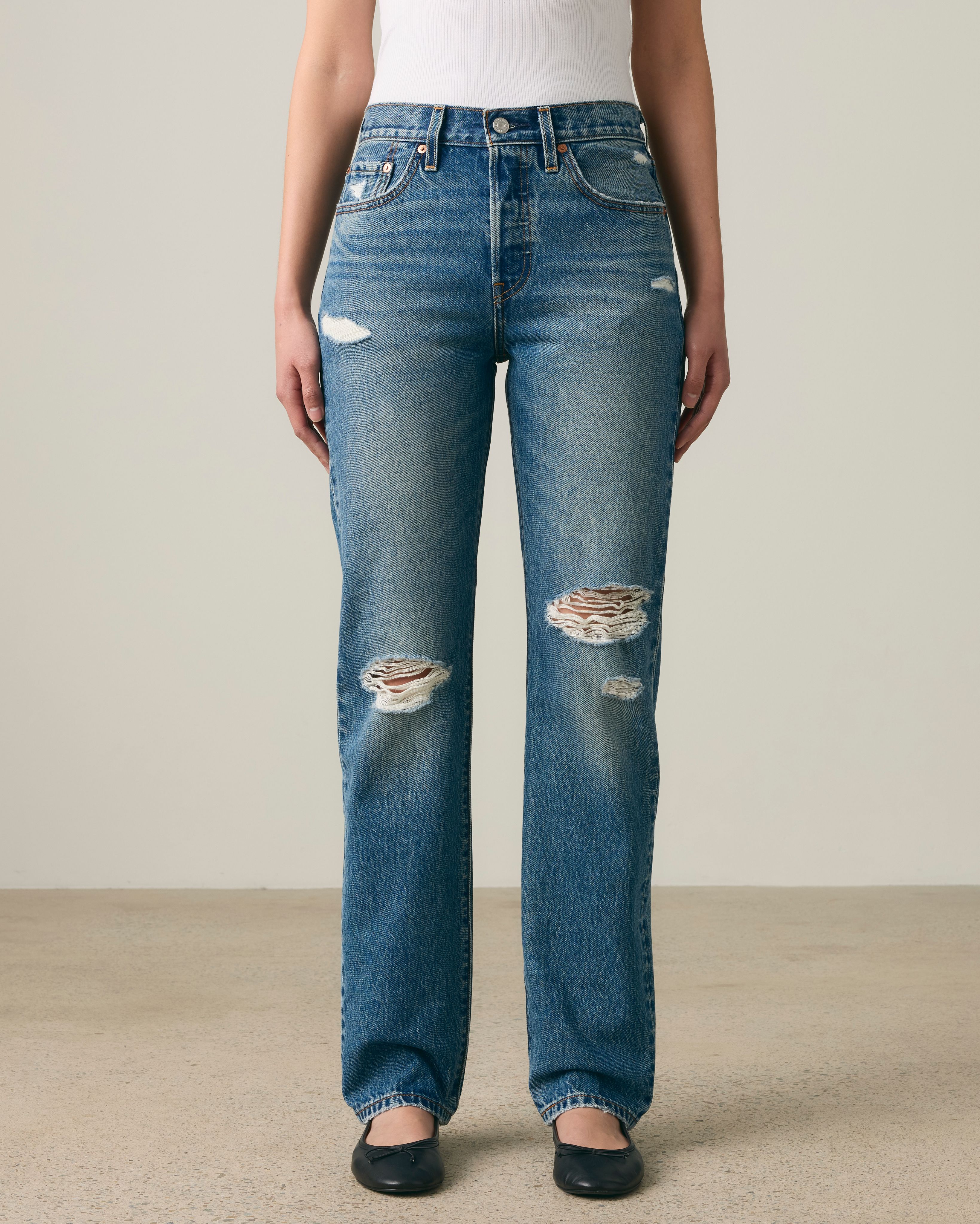 Female model wearing 501® jeans.