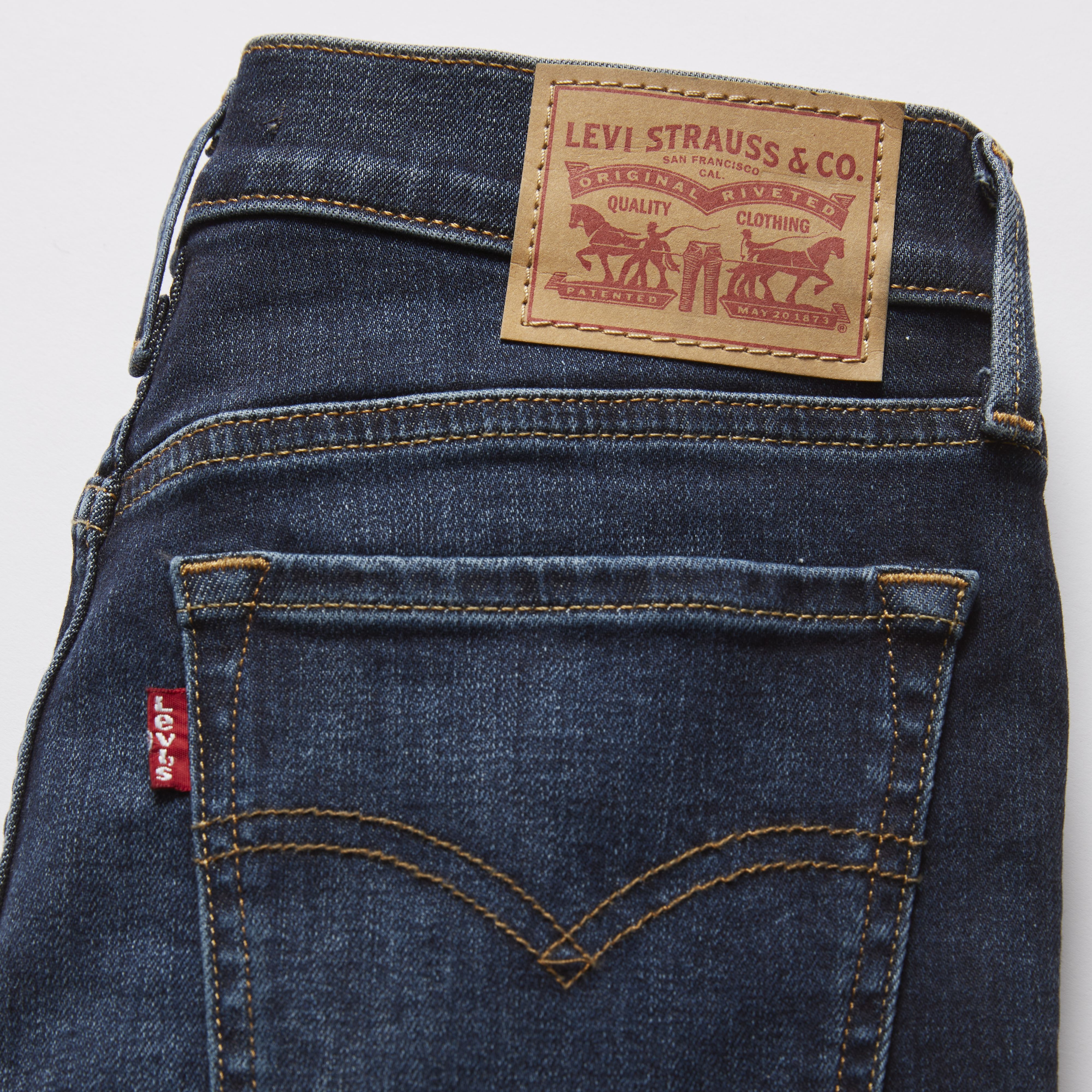 710™ Mid Rise Super Skinny Jeans 7