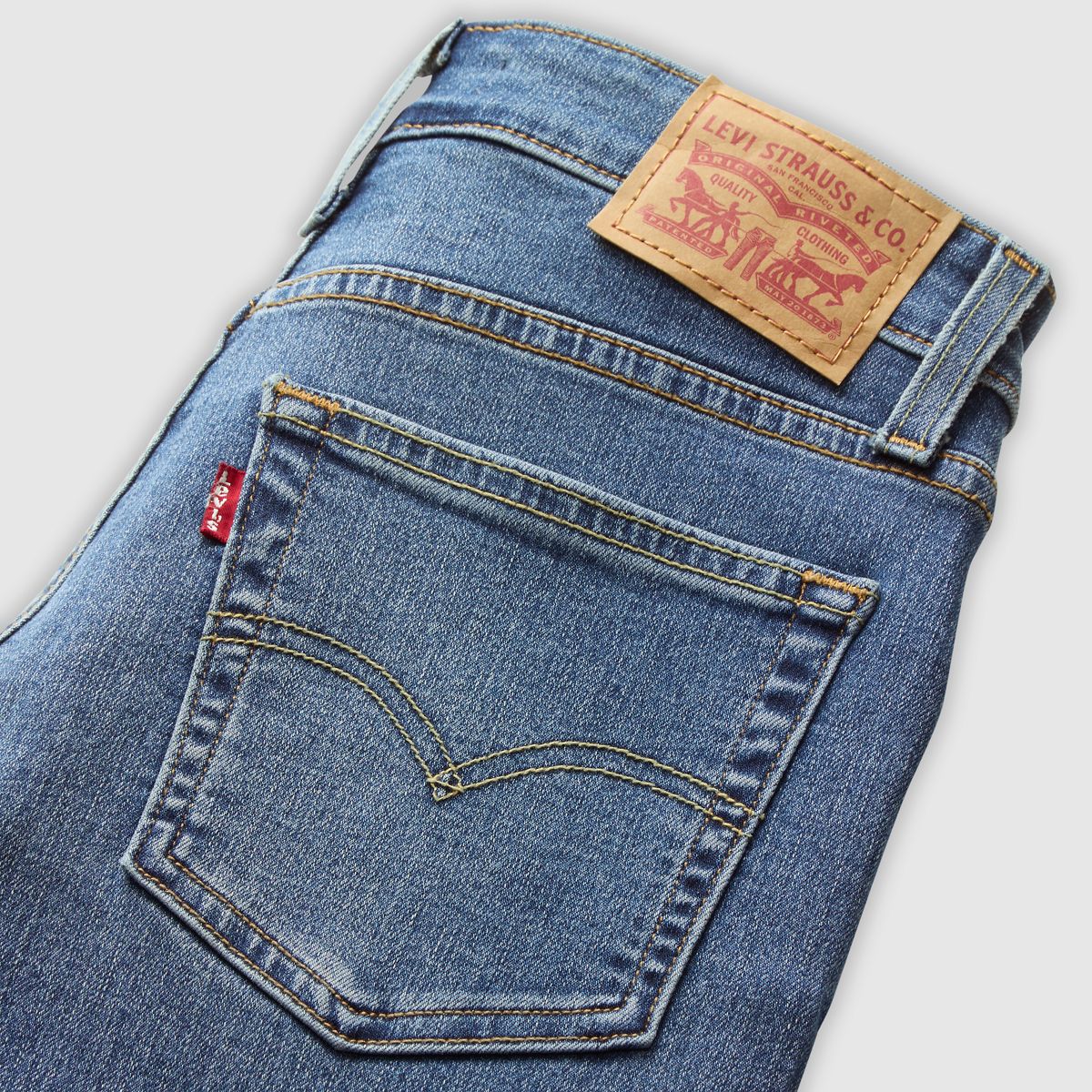 725 High Rise Bootcut Jeans — Hint Of Tint - Medium Wash