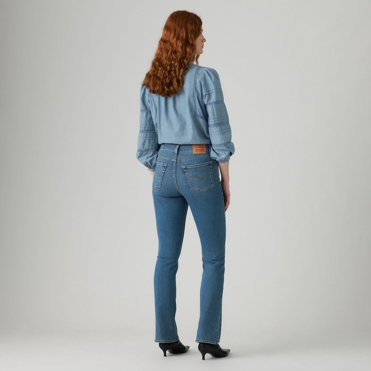 725 High Rise Bootcut Jeans — Hint Of Tint - Medium Wash