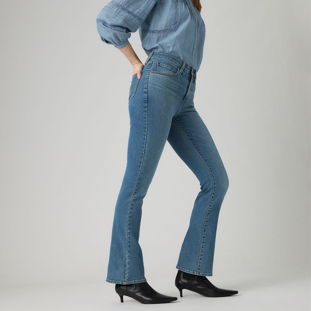 725 High Rise Bootcut Jeans — Hint Of Tint - Medium Wash