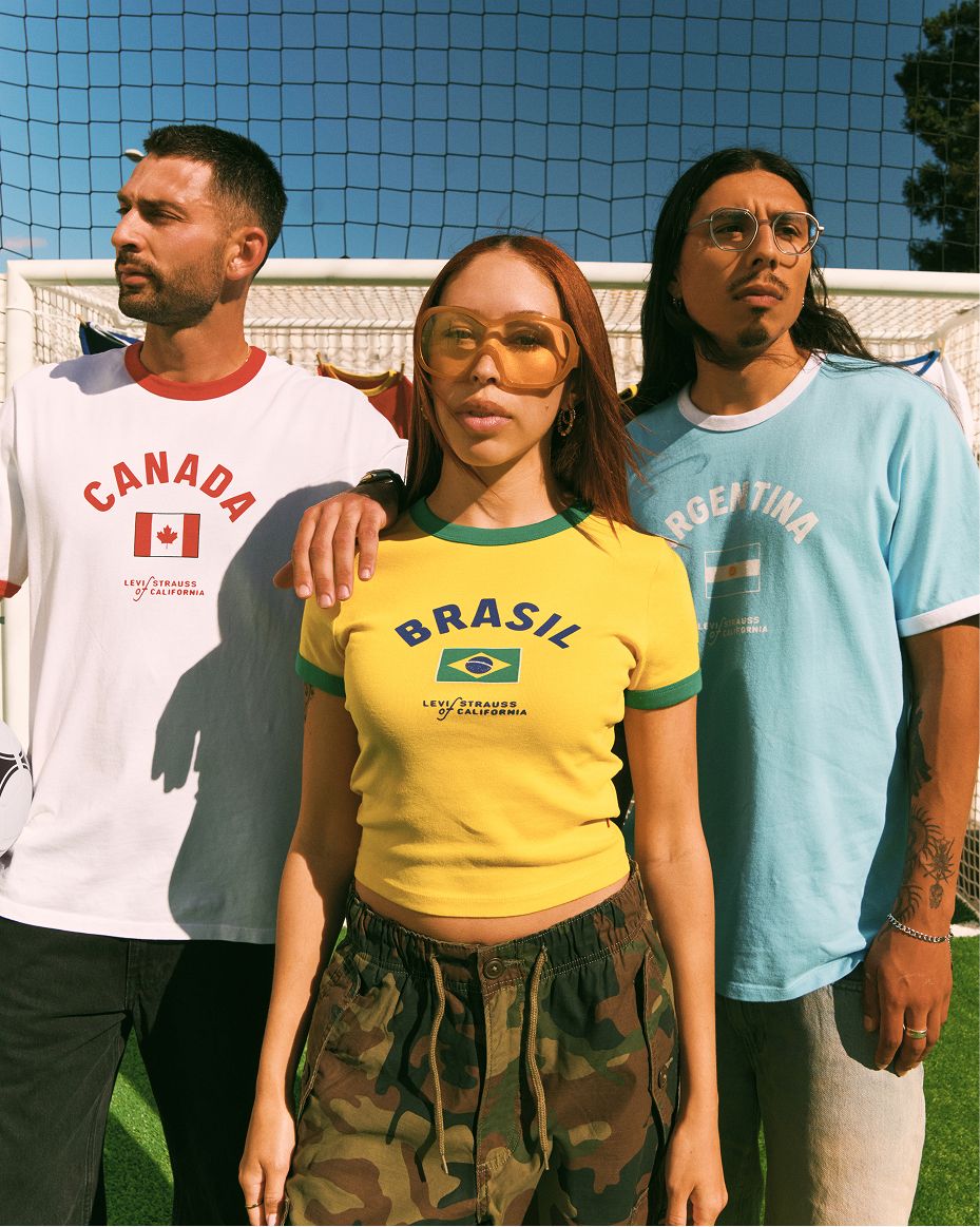 three models in world cup ringer tees 