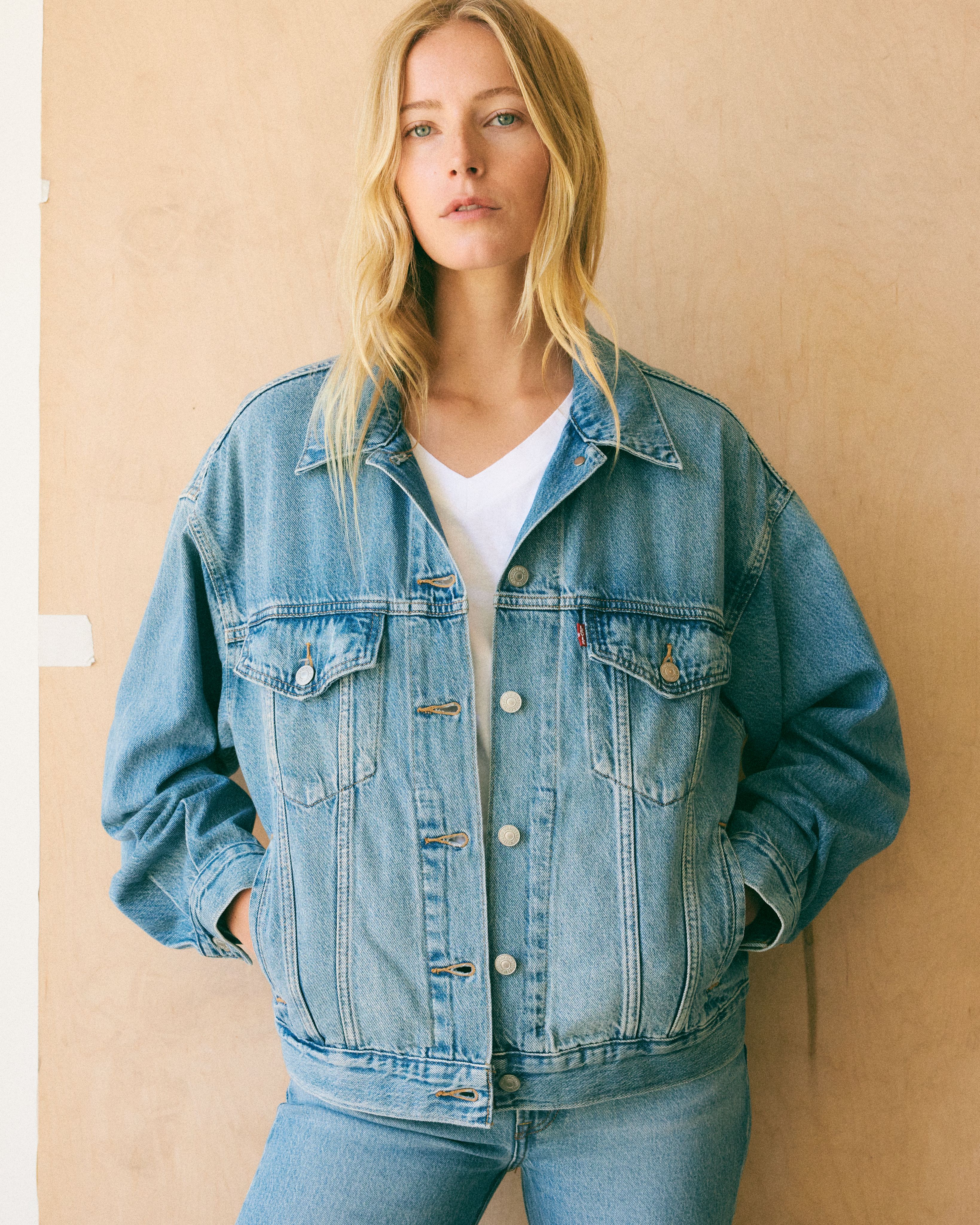 Female model wearing 90's Trucker