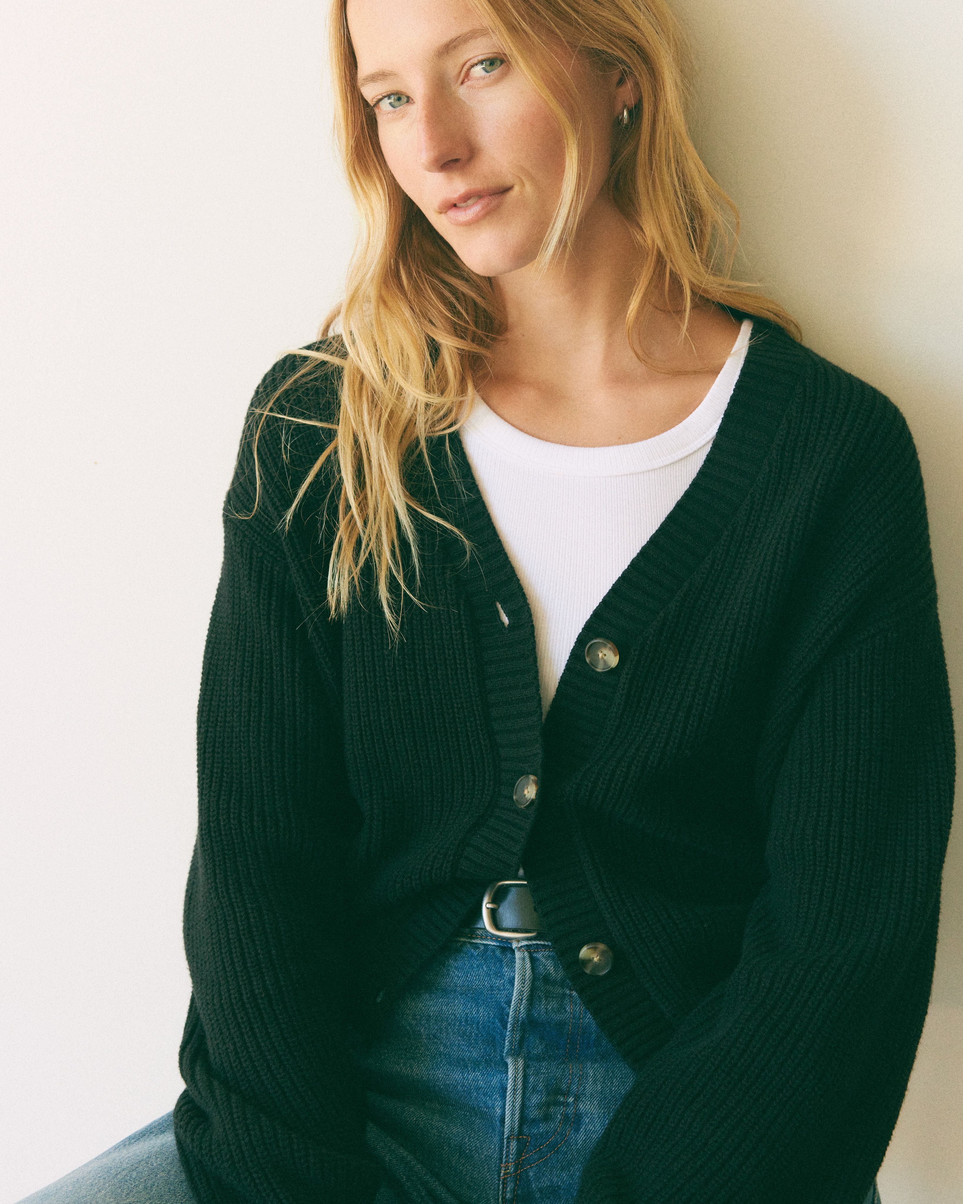 Female model wearing snowflake cardigan
