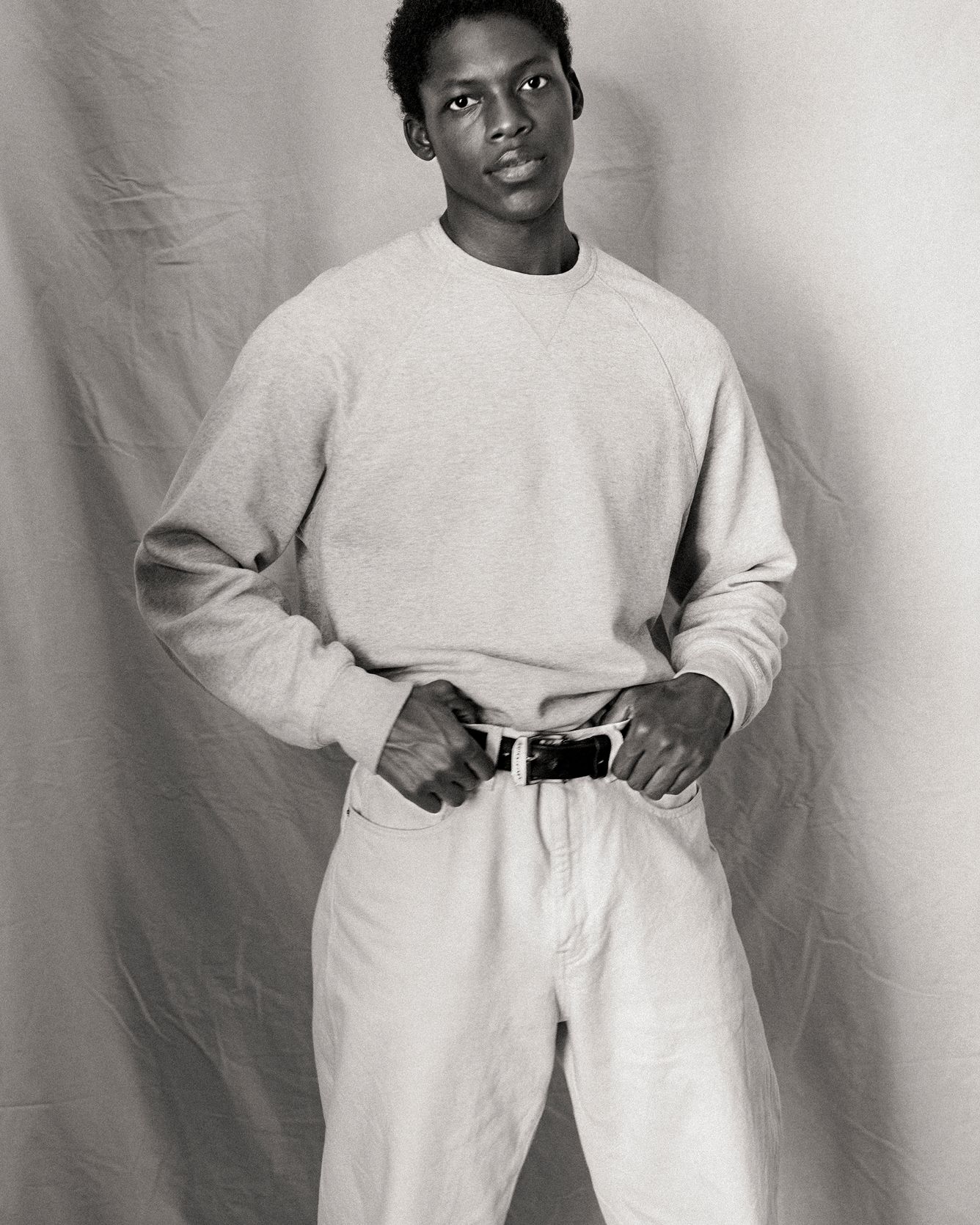 photo of man wearing white denim